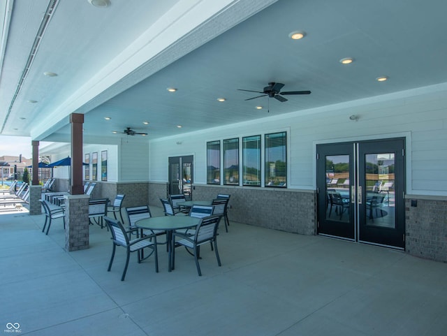 view of patio with ceiling fan and french doors