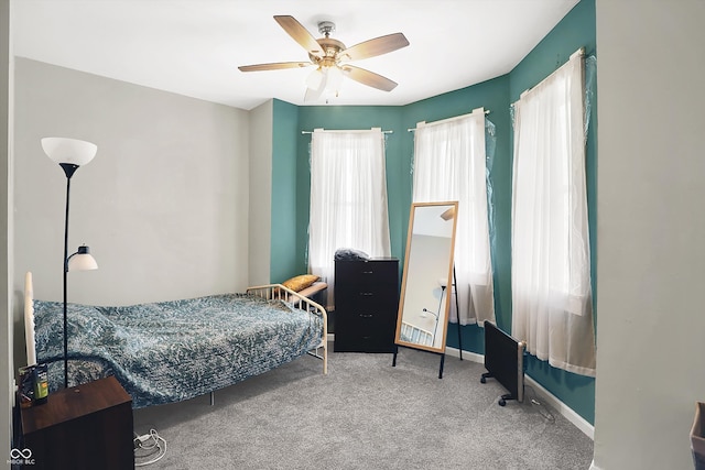 bedroom featuring carpet and ceiling fan