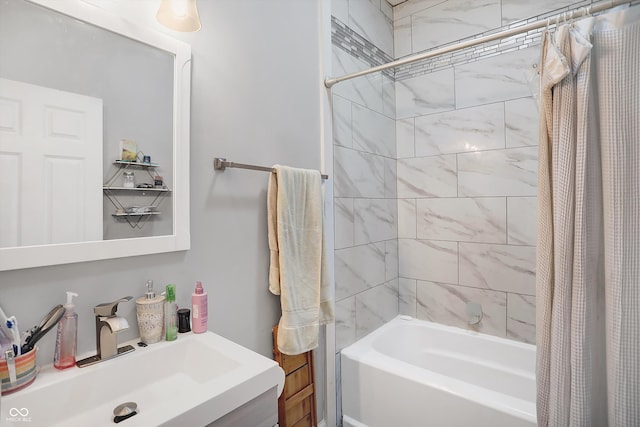 bathroom featuring vanity and shower / tub combo