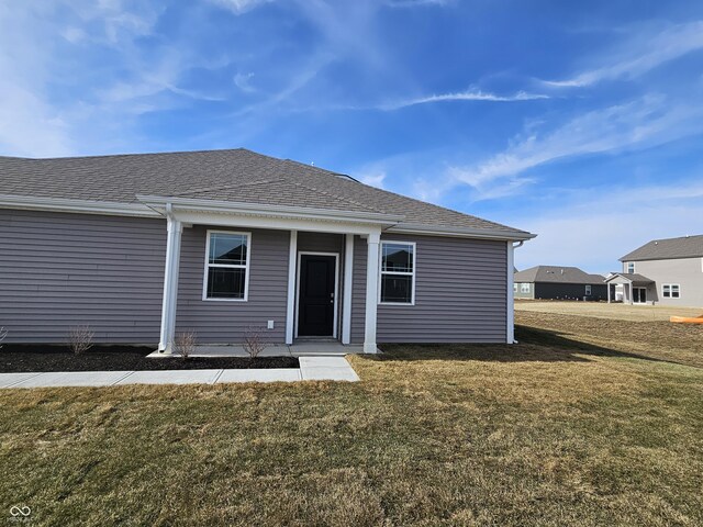 exterior space with a lawn