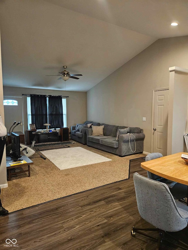 living area featuring dark wood-type flooring, a ceiling fan, vaulted ceiling, and recessed lighting