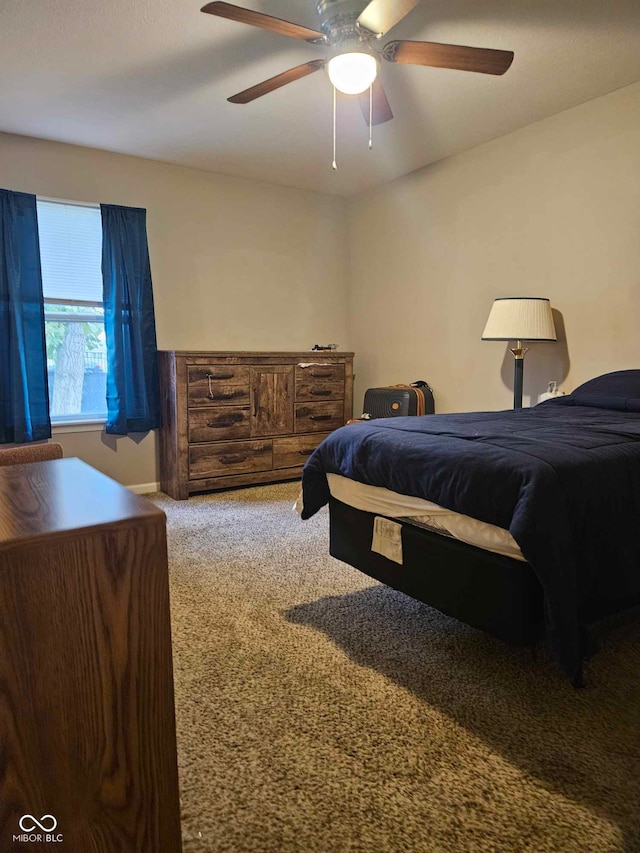 bedroom featuring carpet floors and a ceiling fan