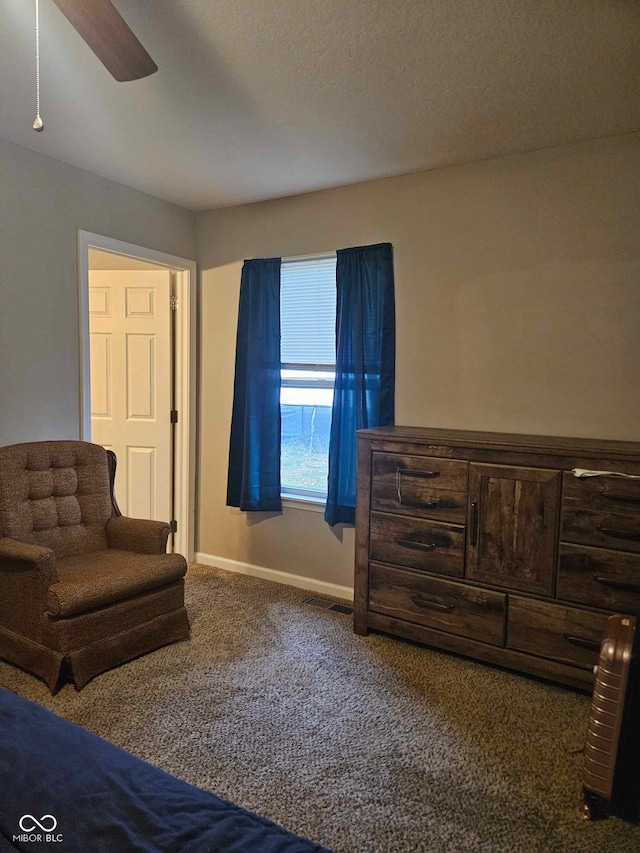 bedroom featuring carpet floors, baseboards, and ceiling fan