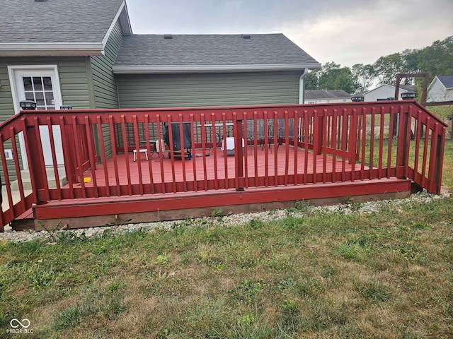 deck featuring a lawn