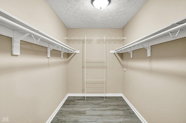2747 E Midland Rd, Indianapolis, IN 46227 - walk in closet featuring wood finished floors
