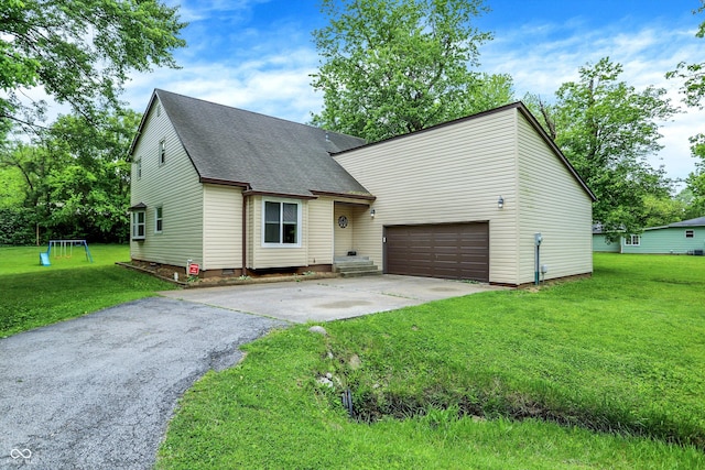 2747 E Midland Rd, Indianapolis, IN 46227 - view of front of house featuring driveway, roof with shingles, a front lawn, and crawl space