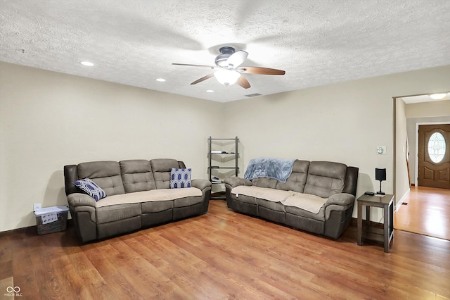 2747 E Midland Rd, Indianapolis, IN 46227 - living room featuring a ceiling fan, wood finished floors, a textured ceiling, recessed lighting, and baseboards