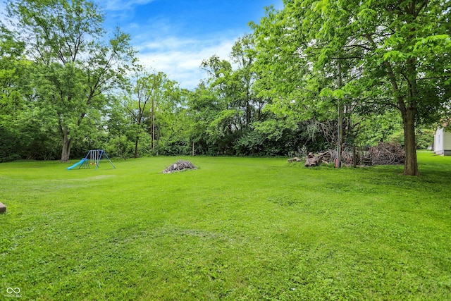 2747 E Midland Rd, Indianapolis, IN 46227 - view of green lawn with view of wooded area