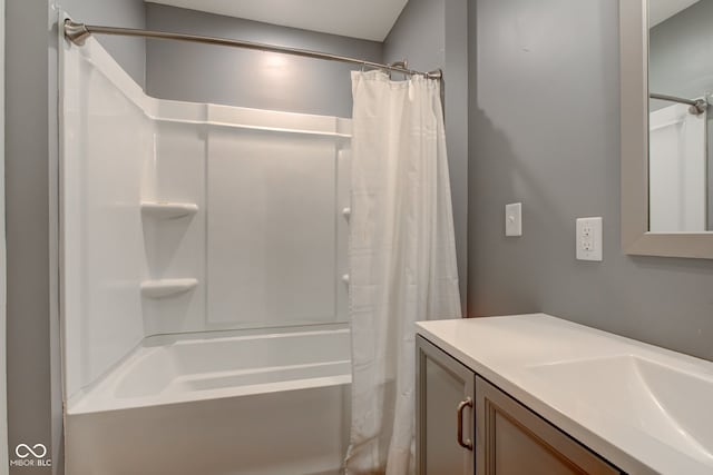 bathroom with vanity and shower / tub combo