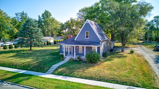 view of front facade with a porch and a front yard