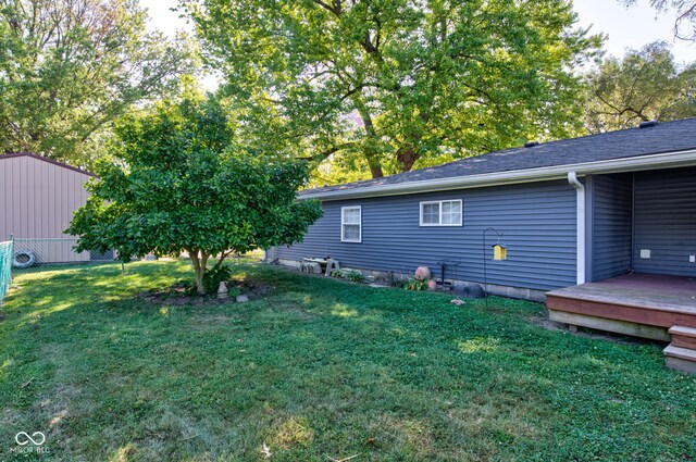 view of yard with a deck