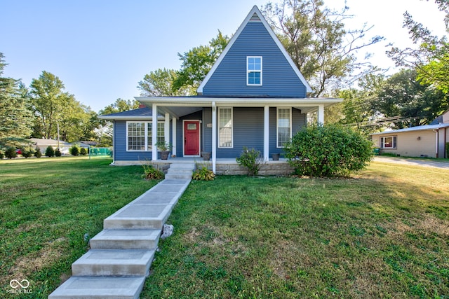 view of front of house featuring covered porch and a front yard