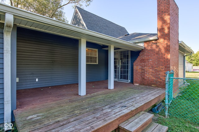 wooden deck featuring fence