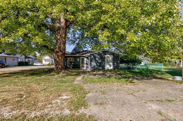 view of front of home with a front yard