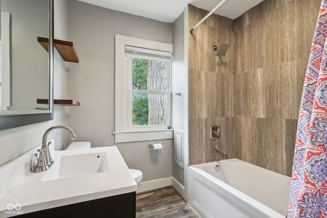 full bathroom featuring vanity, toilet, shower / bathtub combination with curtain, and hardwood / wood-style flooring