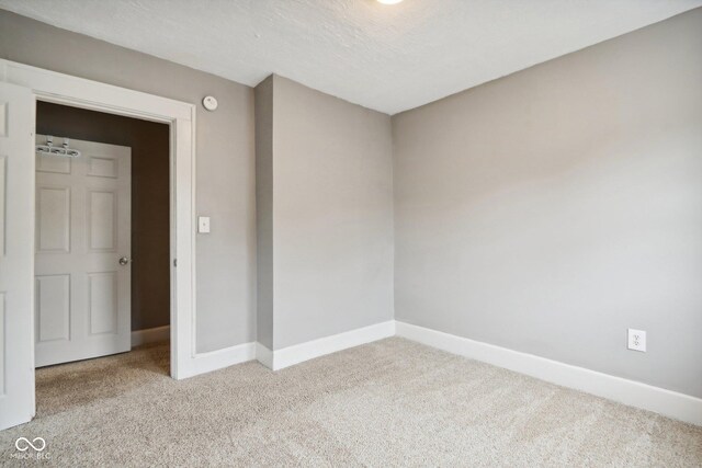 3005 Broadway St, Indianapolis, IN 46205 - carpeted empty room featuring baseboards