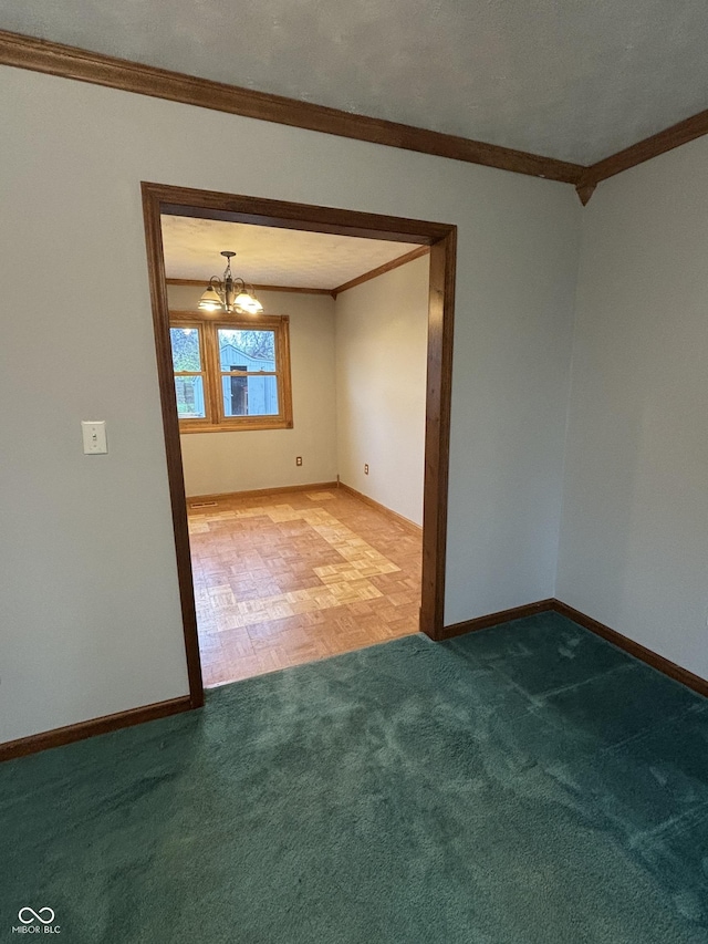8855 N Waverly Park Rd, Martinsville, IN 46151 - empty room with carpet flooring, baseboards, a chandelier, and ornamental molding