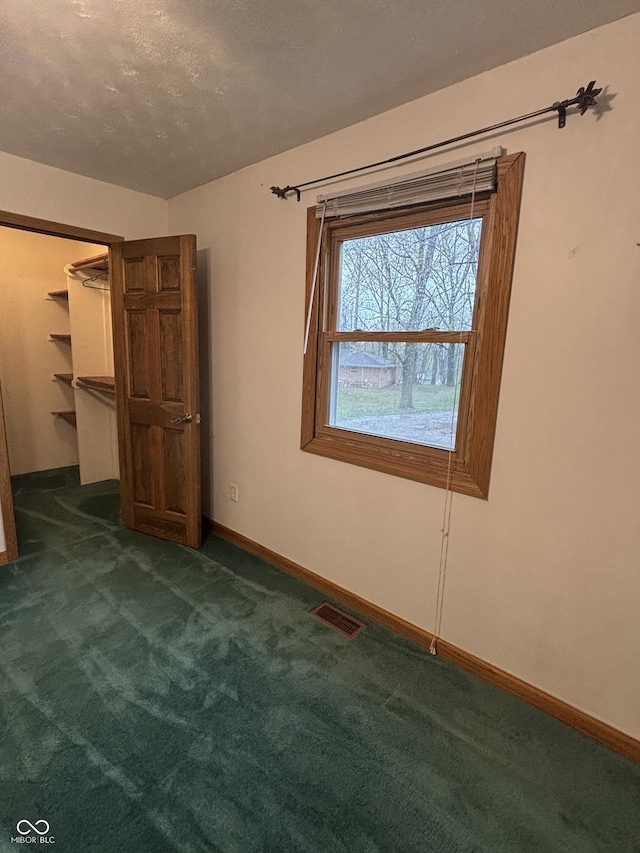 8855 N Waverly Park Rd, Martinsville, IN 46151 - unfurnished room featuring visible vents, baseboards, carpet flooring, and a textured ceiling