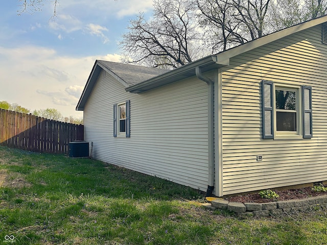 8855 N Waverly Park Rd, Martinsville, IN 46151 - view of property exterior featuring a yard, central AC unit, and fence