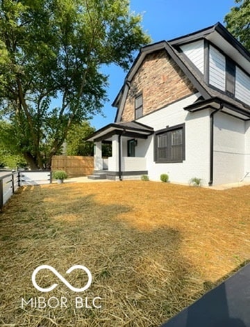 view of home's exterior featuring a lawn