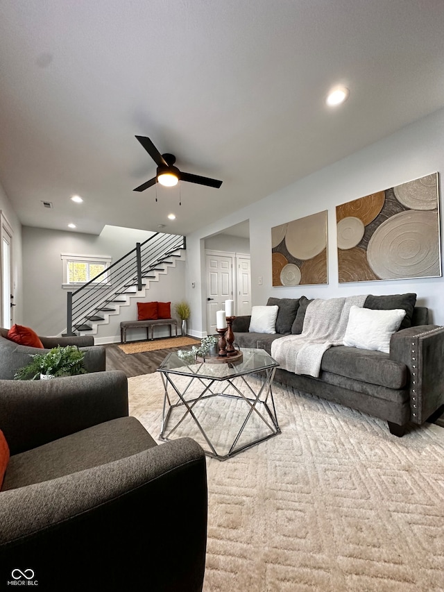 living room with ceiling fan