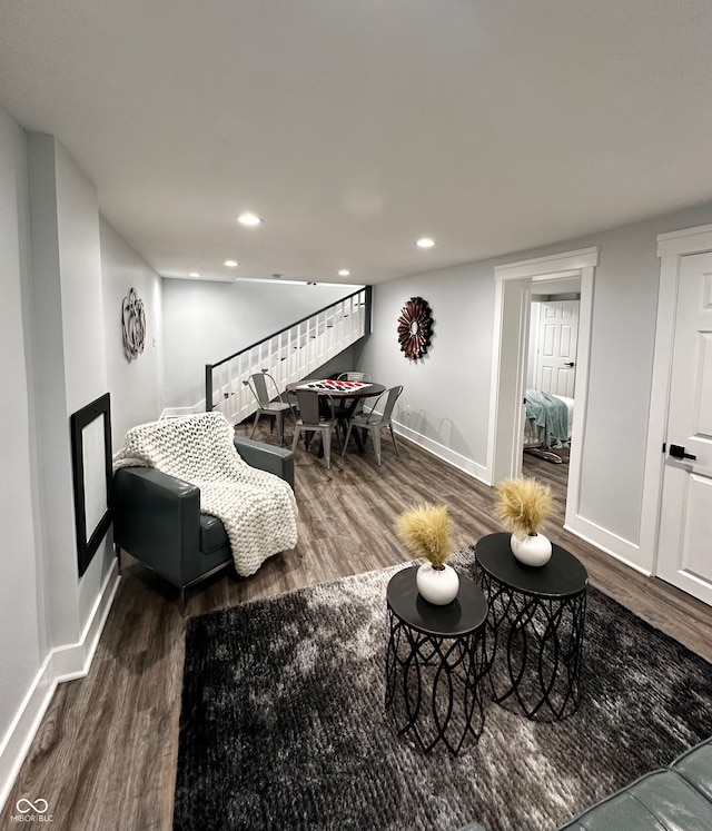 living room featuring dark hardwood / wood-style flooring