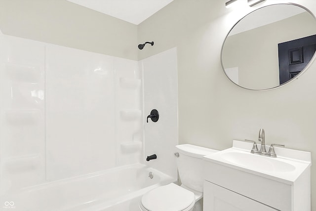 full bathroom featuring tub / shower combination, vanity, and toilet