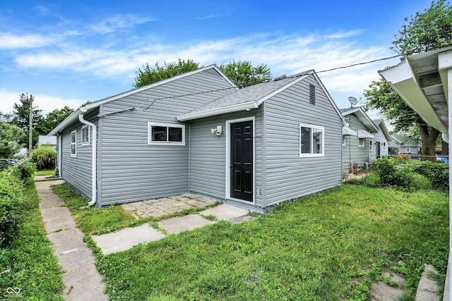 exterior space with a lawn