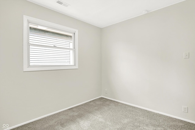 spare room with carpet flooring