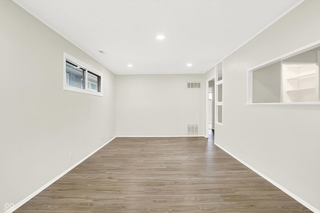 basement featuring hardwood / wood-style flooring