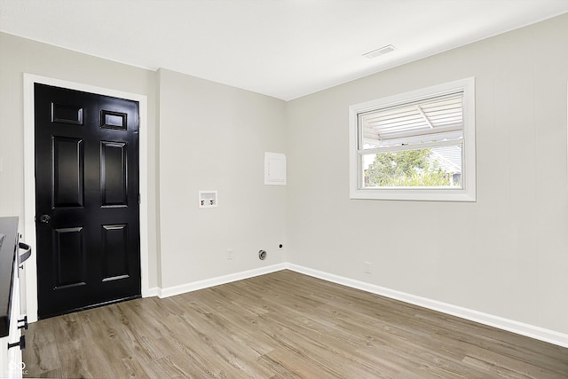 empty room with light hardwood / wood-style floors