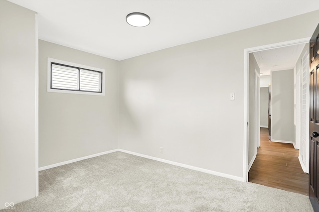 unfurnished room with carpet