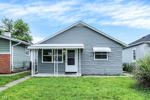 view of front of home with a front yard