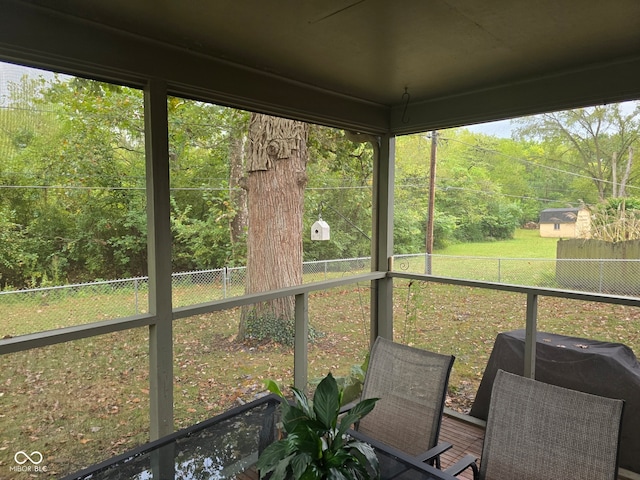 sunroom with plenty of natural light