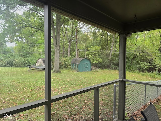 view of yard with a storage unit