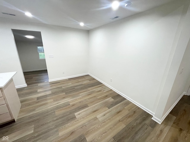 empty room featuring hardwood / wood-style flooring