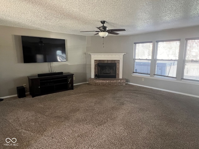 unfurnished living room featuring a fireplace, a textured ceiling, carpet, and ceiling fan