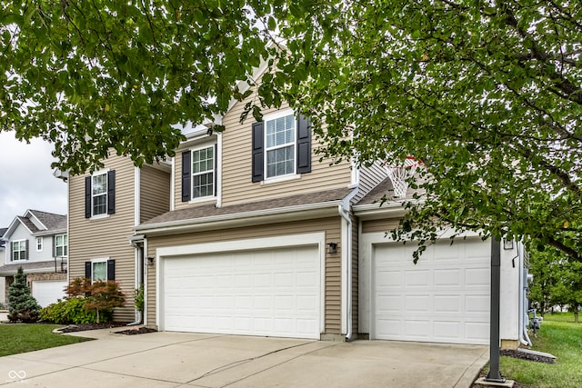 view of front of home with a garage