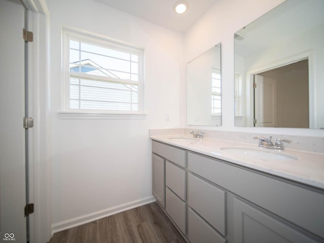 7888 Magnolia St, New Palestine, IN 46163 - full bath featuring double vanity and wood finished floors