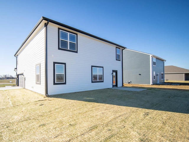 7888 Magnolia St, New Palestine, IN 46163 - rear view of property featuring a garage