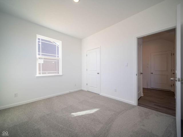 7888 Magnolia St, New Palestine, IN 46163 - unfurnished room featuring baseboards and carpet floors