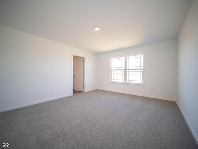 7888 Magnolia St, New Palestine, IN 46163 - unfurnished room featuring dark carpet and baseboards