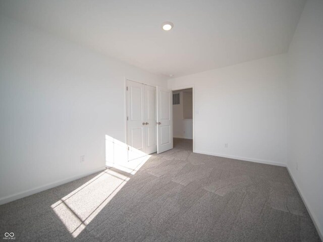 7888 Magnolia St, New Palestine, IN 46163 - empty room with carpet and recessed lighting