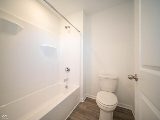 7888 Magnolia St, New Palestine, IN 46163 - bathroom with wood finished floors and shower / washtub combination