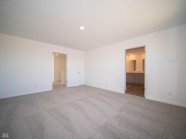 7888 Magnolia St, New Palestine, IN 46163 - unfurnished bedroom featuring carpet flooring, ensuite bath, and recessed lighting