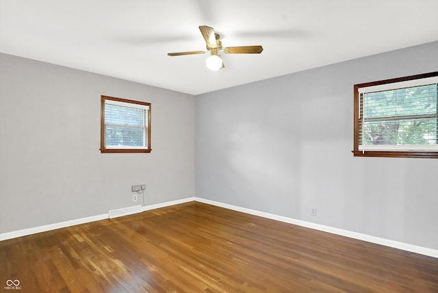 unfurnished room featuring ceiling fan and wood-type flooring