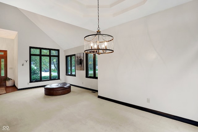 interior space with an inviting chandelier and light carpet