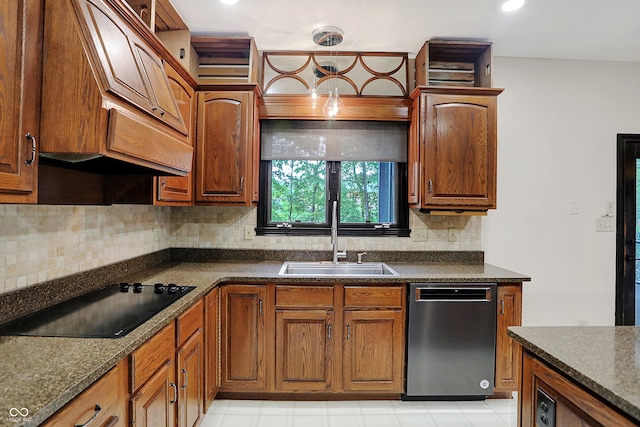 kitchen with black electric cooktop, backsplash, sink, and stainless steel dishwasher