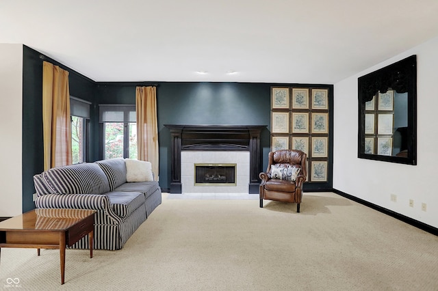 living room with light colored carpet and a tile fireplace