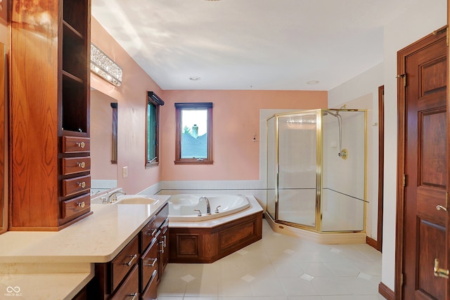 bathroom featuring shower with separate bathtub, tile patterned flooring, and vanity